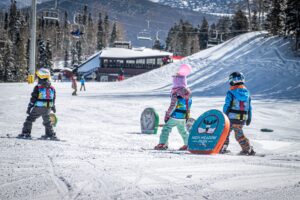 Kids skiing in High Meadow Park in Canyons Village at Park City